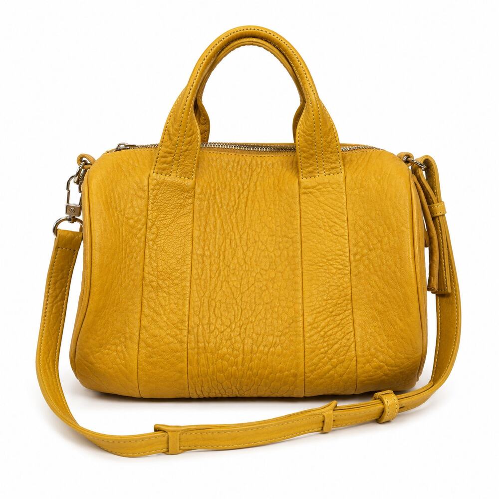 Alexander Wang Rocco Duffel Bag Mustard Yellow Pebbled Leather Studded Bottom